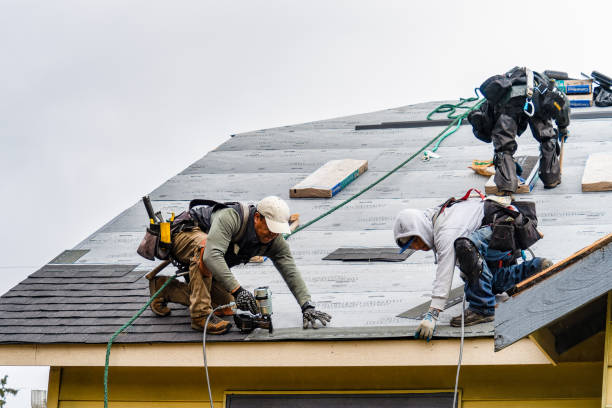 Professional Gutter Installation technician working in Ridge, MD